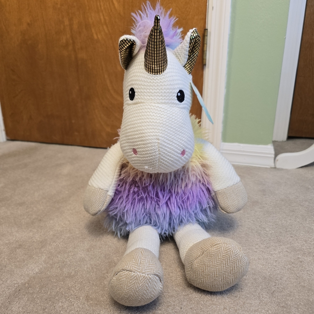 Hug Me brand unicorn, which is perfect because it looks very huggable!